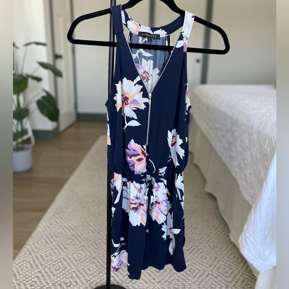 Floral romper with synched waist.